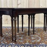 English nesting tables in mahogany and leather top under glass - work from the 1950s