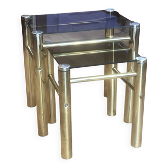 Nesting tables with glass top and chrome legs