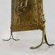 Fireplace screen in repoussé brass with a sailing boat. 1960s.