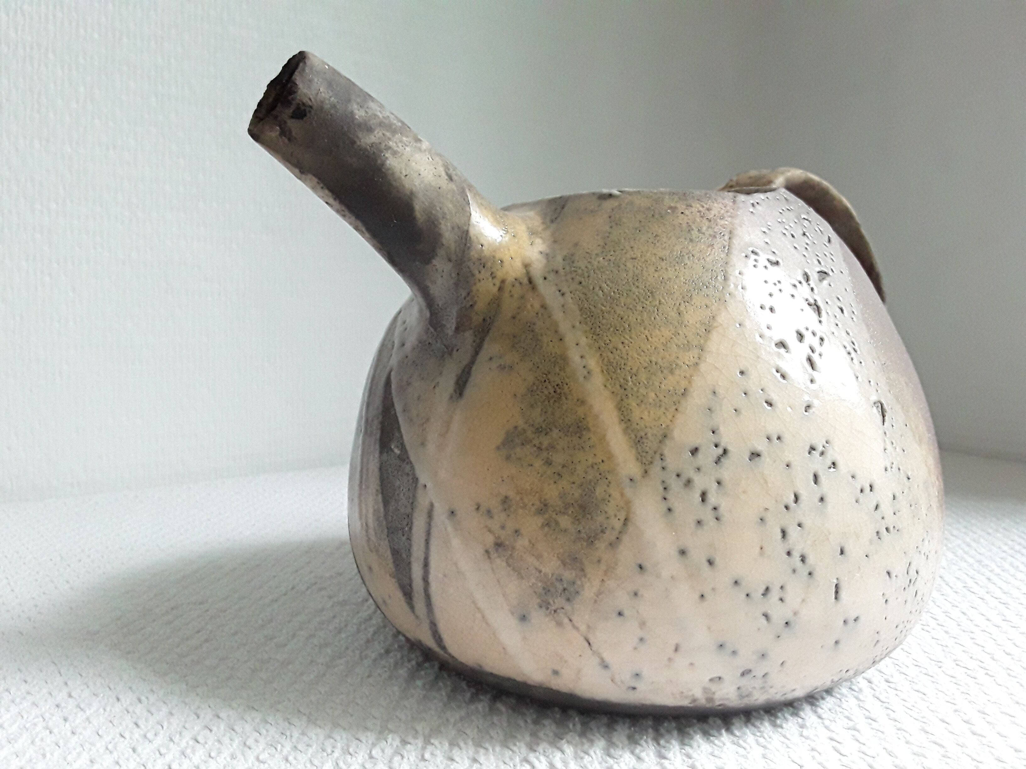 Pitcher or teapot in raku