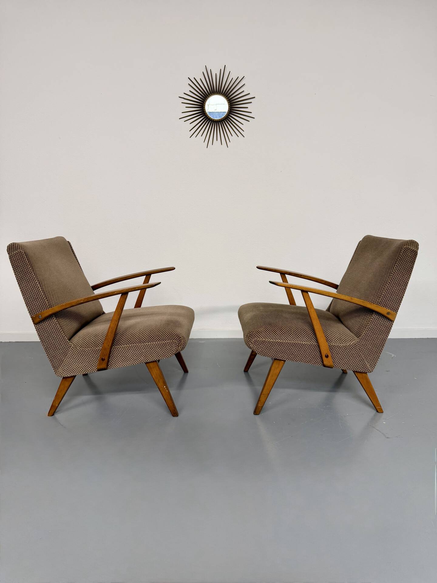 Set of 2 vintage wooden and fabric armchairs designed in the 1960s.