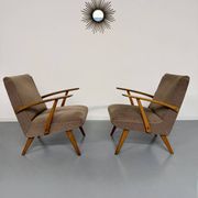 Set of 2 vintage wooden and fabric armchairs designed in the 1960s.