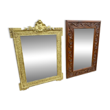 Two antique 19th century mirrors in carved Napoleon oak wood