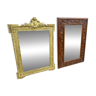 Two antique 19th century mirrors in carved Napoleon oak wood