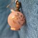 Antique lamp base with globe from the early 20th century.
