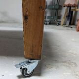 Farm table mounted on casters