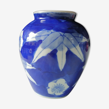 old vase in white and blue ceramics