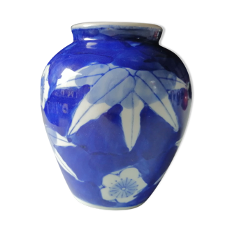 old vase in white and blue ceramics