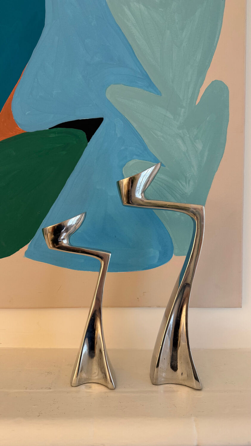 Set of 2 Swann candle holders by Matthew Hilton