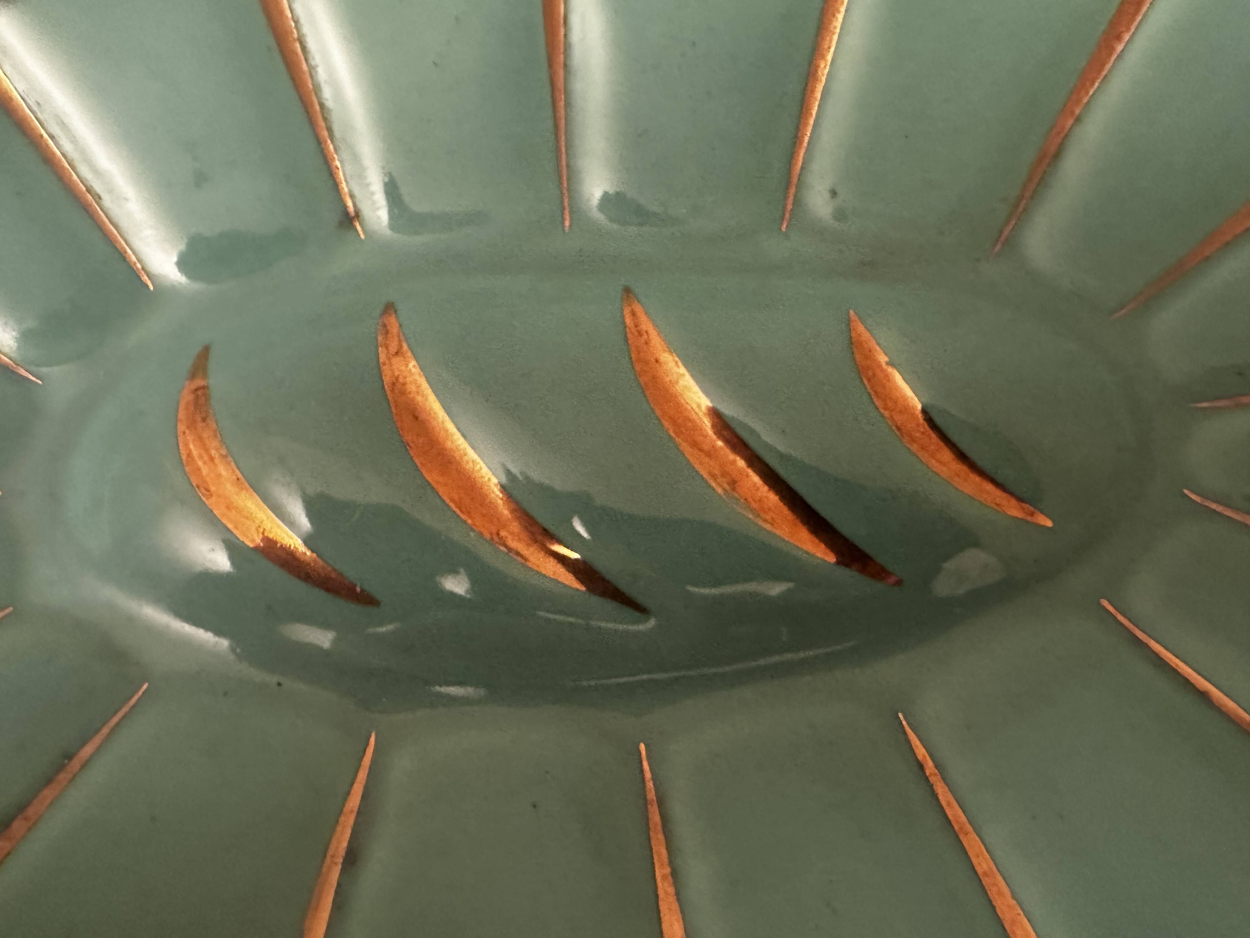 Art Deco ceramic pocket vase in celadon green and gold, style Arthur Percy L34/P22.