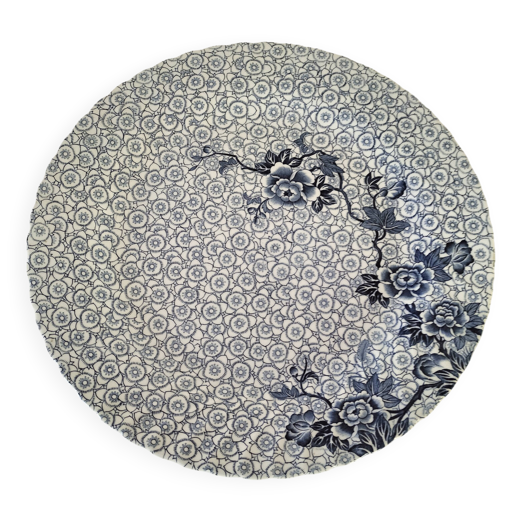 Round antique plate by Johnson Brothers in the Blue Lotus pattern.
