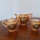 Miniature porcelain tea service with painted flowers - play food