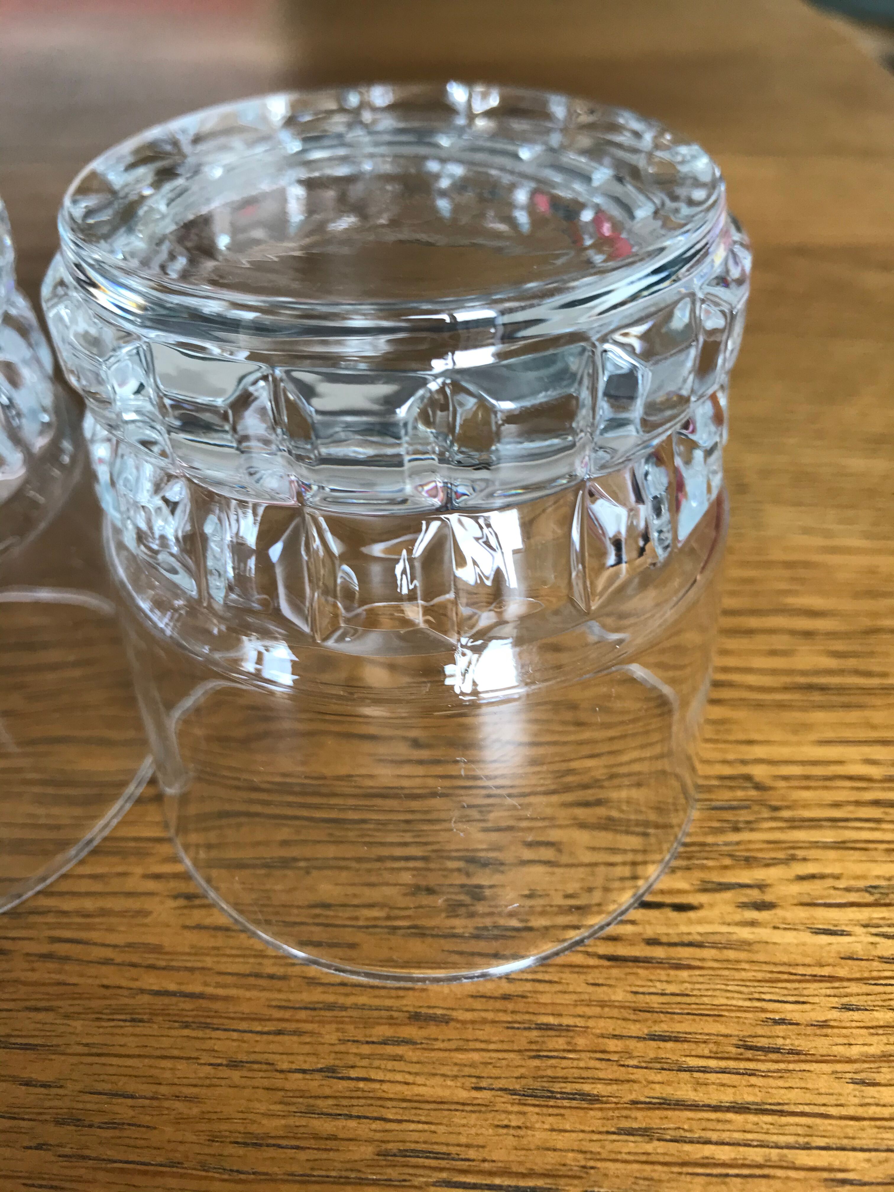 Mismatched decanter and whiskey glasses