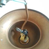 Pair of frosted glass flower pendant lights with vintage wood and brass