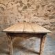 Antique French coffee table in pine with an oak skirt (18th–19th century)