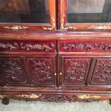 Asia 19th century: Ancient lacquer library, richly carved and adorned.