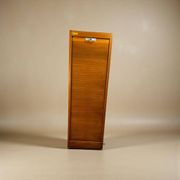 Narrow vintage wooden cabinet with roller shutter 'Soennecken'