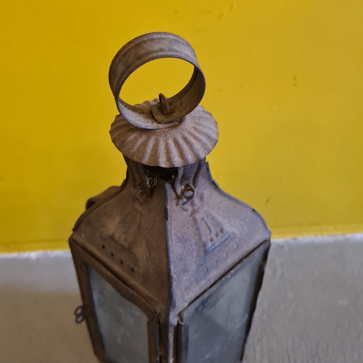 Antique french metal walking candle lantern. from around 1900.
