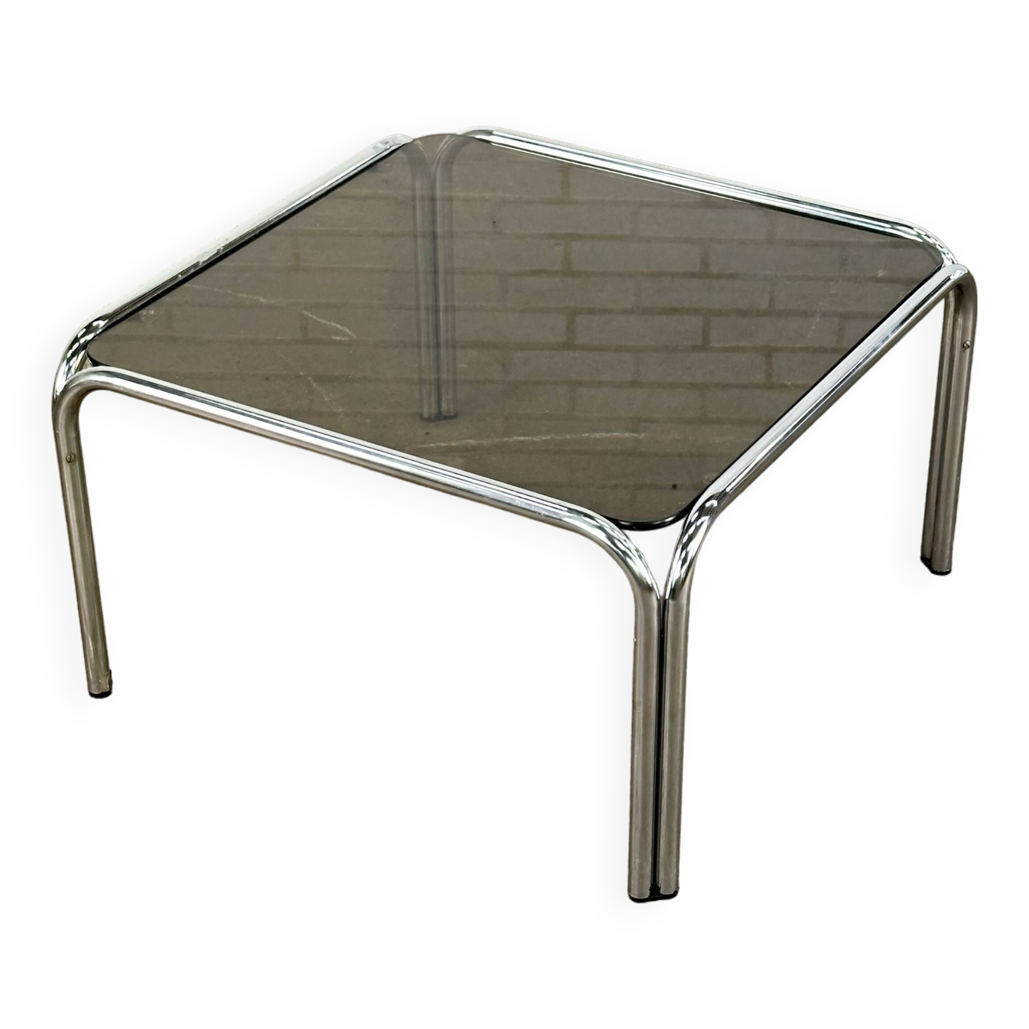 Table basse design vintage en verre fumé avec structure tubulaire