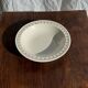 Set of a salad bowl and a vintage brown circular dish D28.