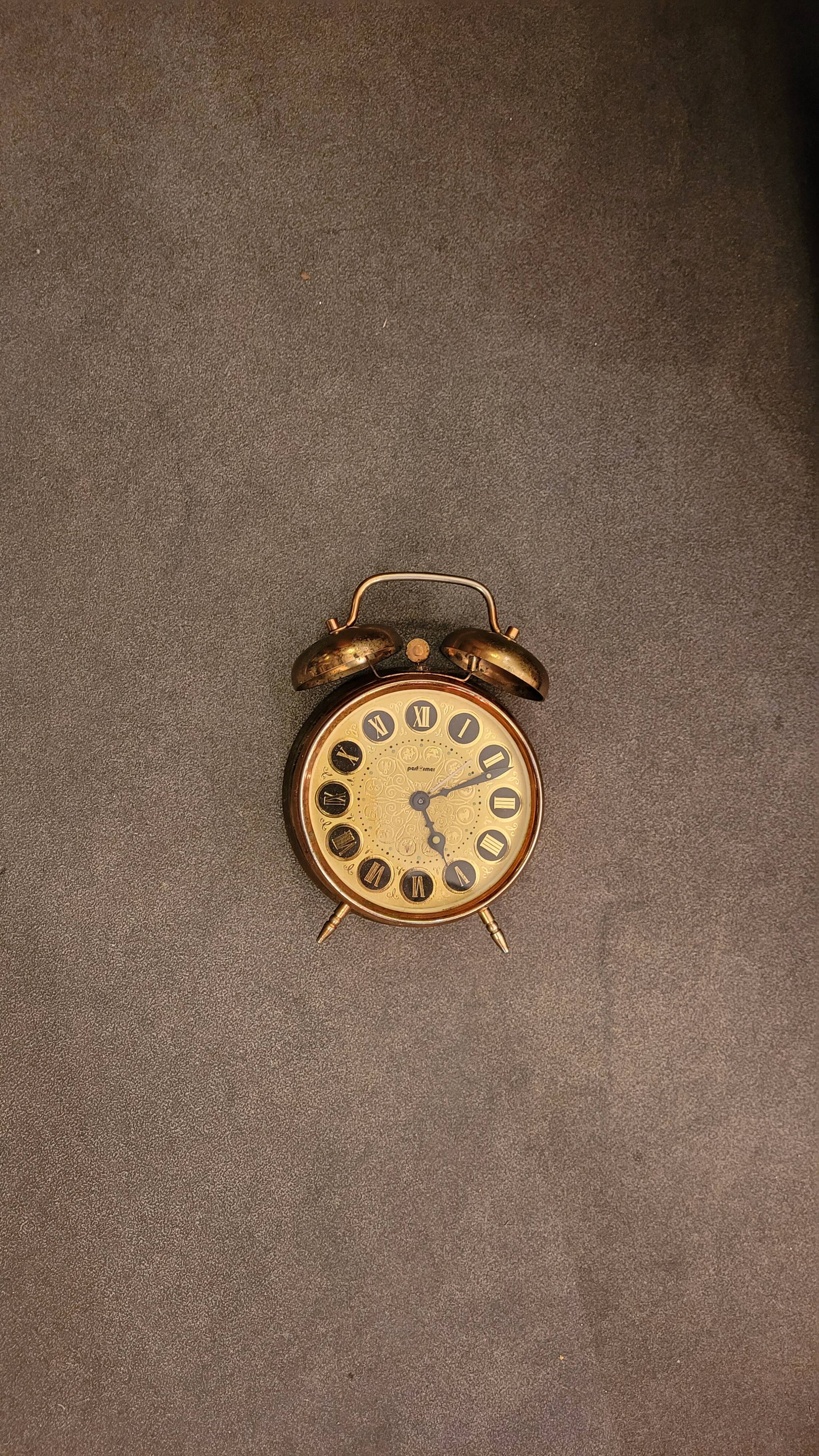 Mechanical alarm clock bell in vintage copper