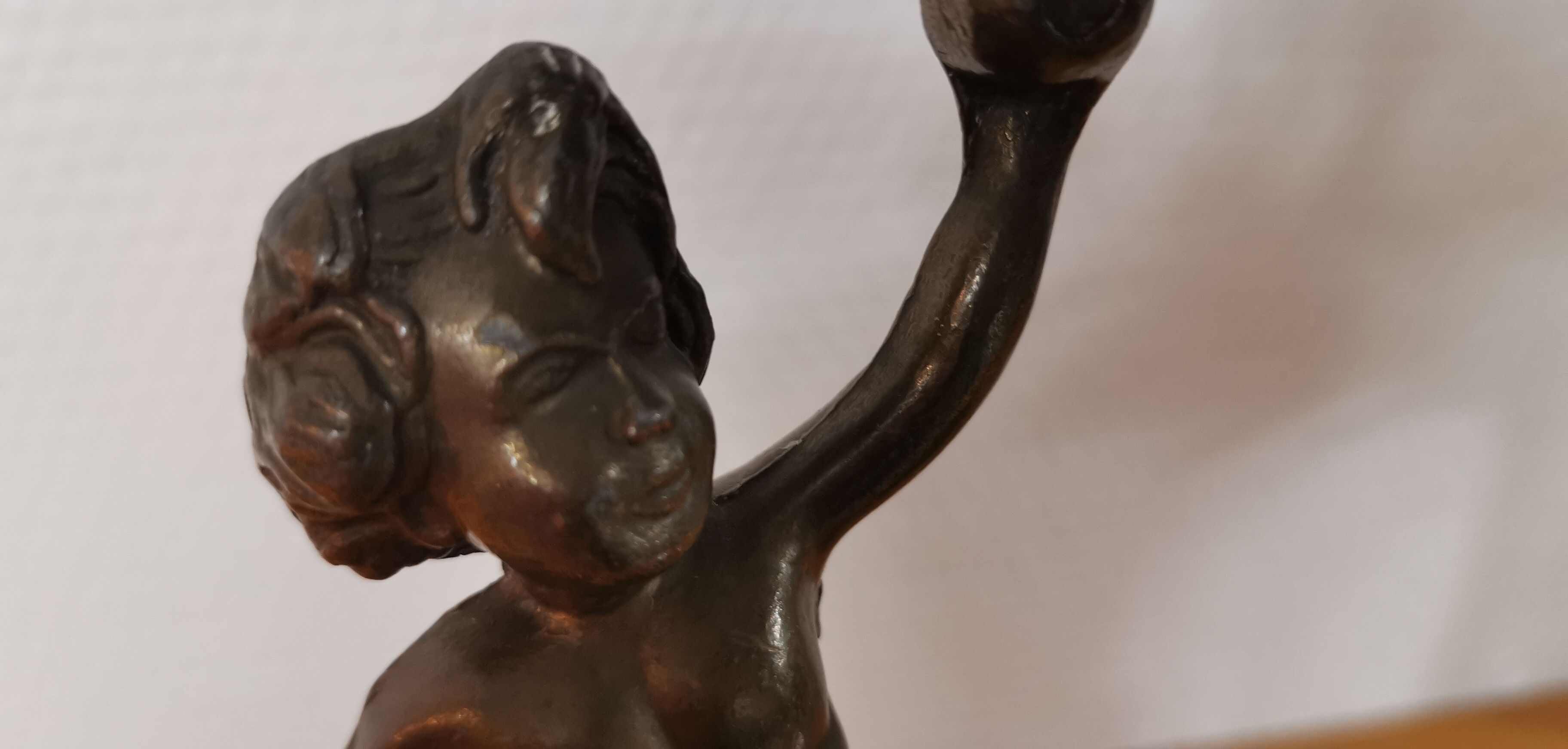 Pair of antique candlesticks in bronze and brass