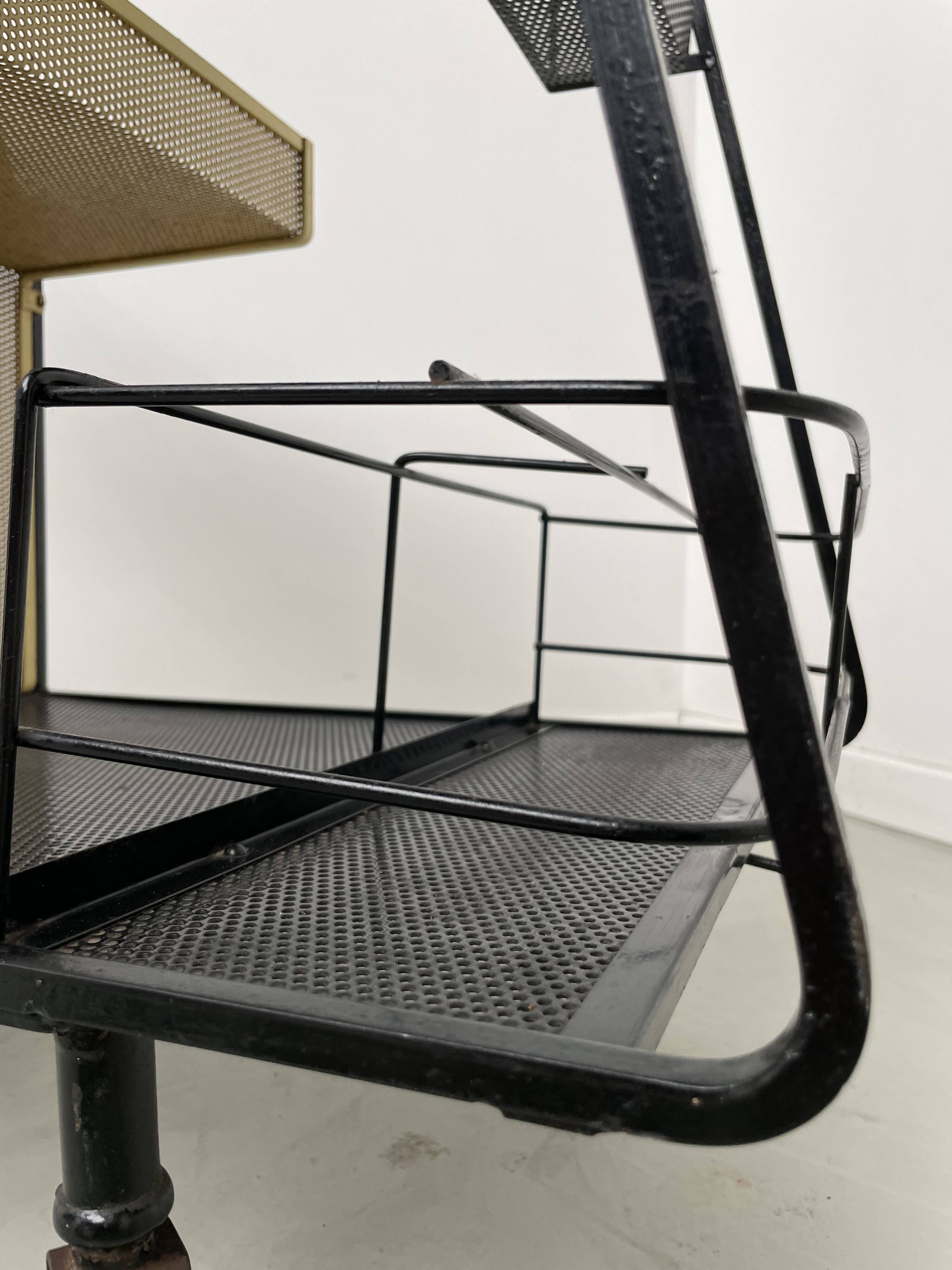 Perforated metal serving trolley in the Mathieu Matégot style
