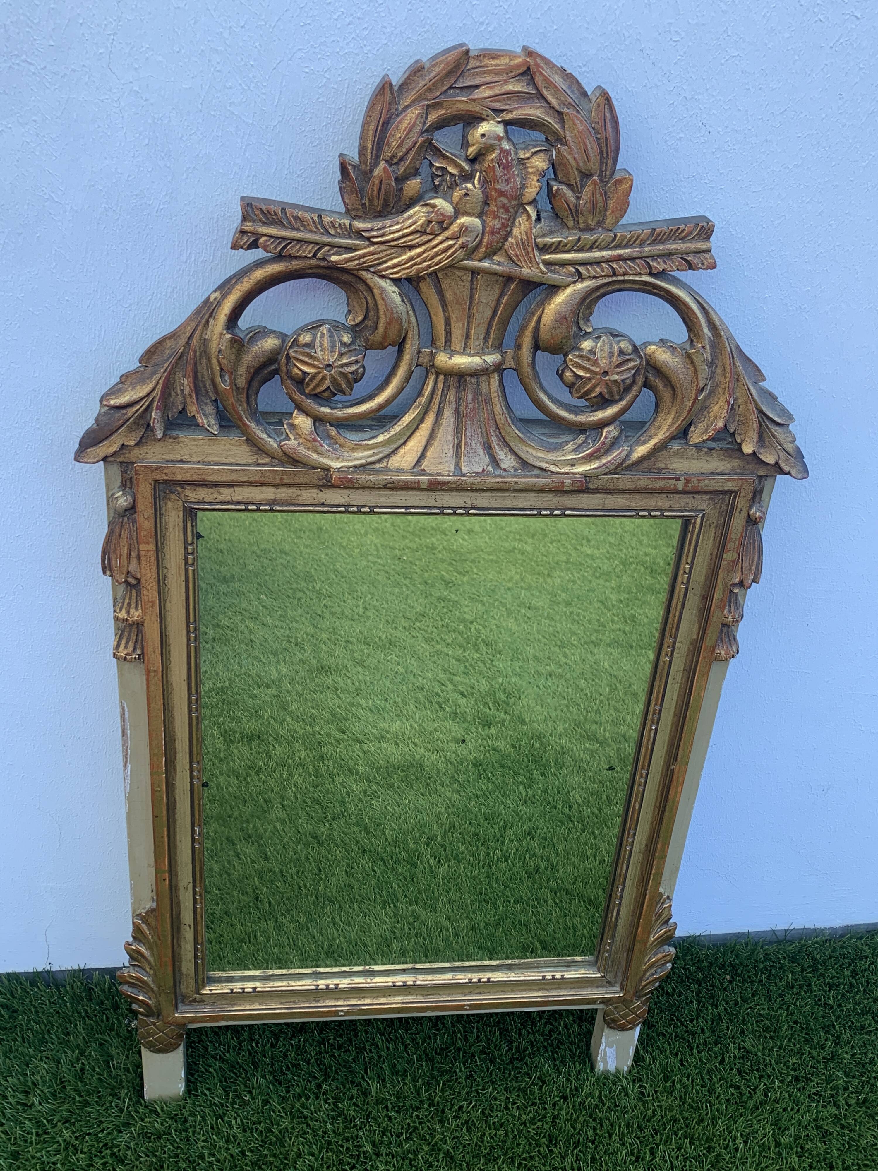 Antique mirror with gilded wood pediment, Louis XVI style
