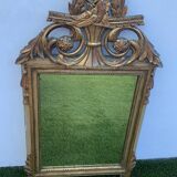 Antique mirror with gilded wood pediment, Louis XVI style