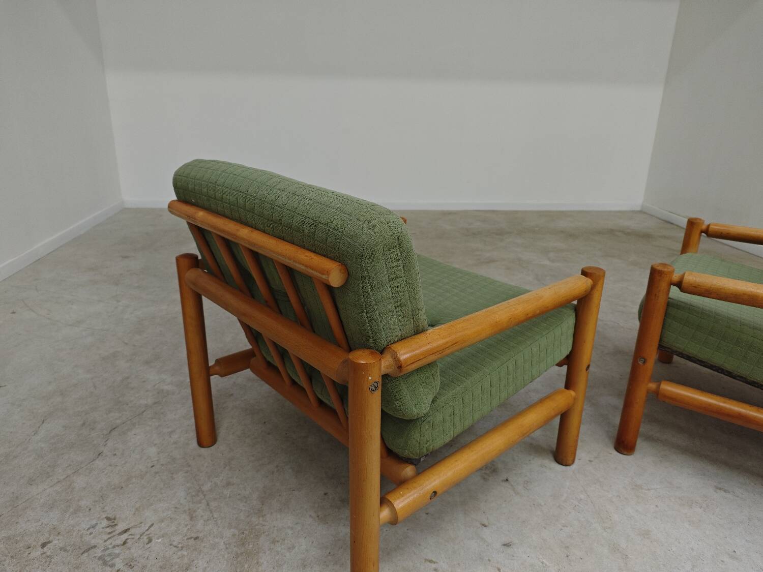 Pair of chalet style armchairs in green fabric