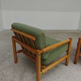 Pair of chalet style armchairs in green fabric
