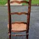 Chaise basse paillee dite chauffeuse
