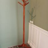 Wooden coat rack on stand