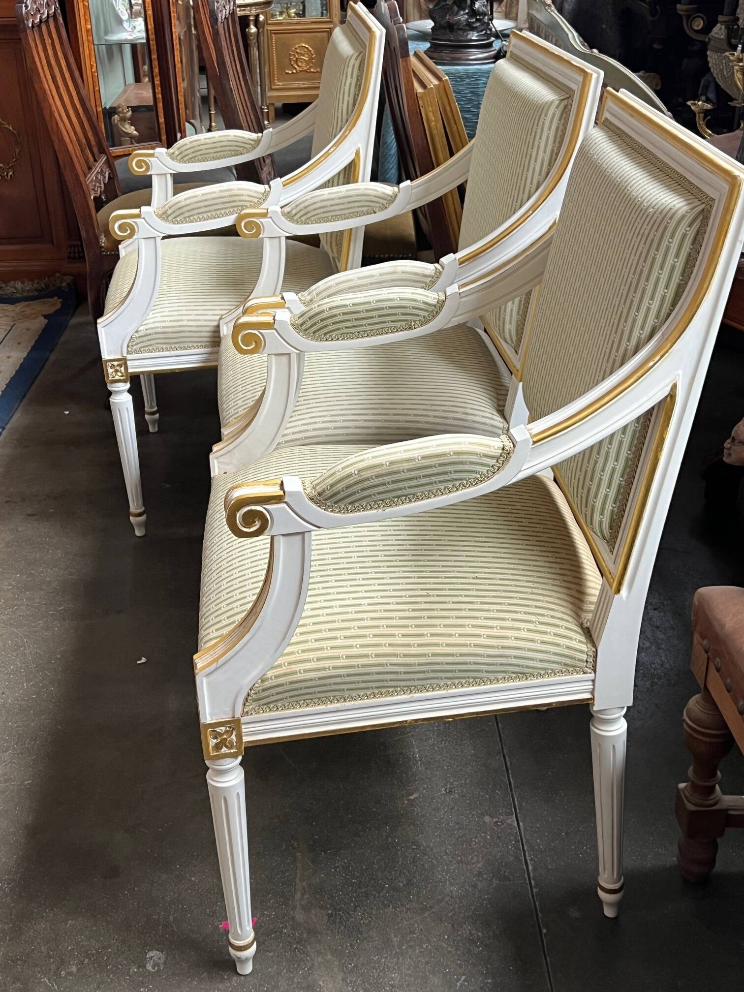 Set of four classic Louis XVI armchairs. Solid wood.