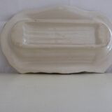 Plate of asparagus with a sauce.