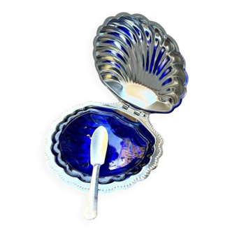 stainless steel butter dish in the shape of a shell and blue glass
