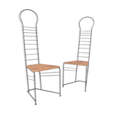 Pair of iron and straw chairs, 1980s.