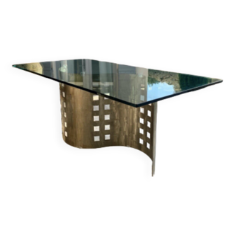 Table de salle à manger design en métal brossé et plateau de verre