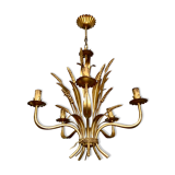 Golden suspension 5 fires with a bouquet of ears of wheat