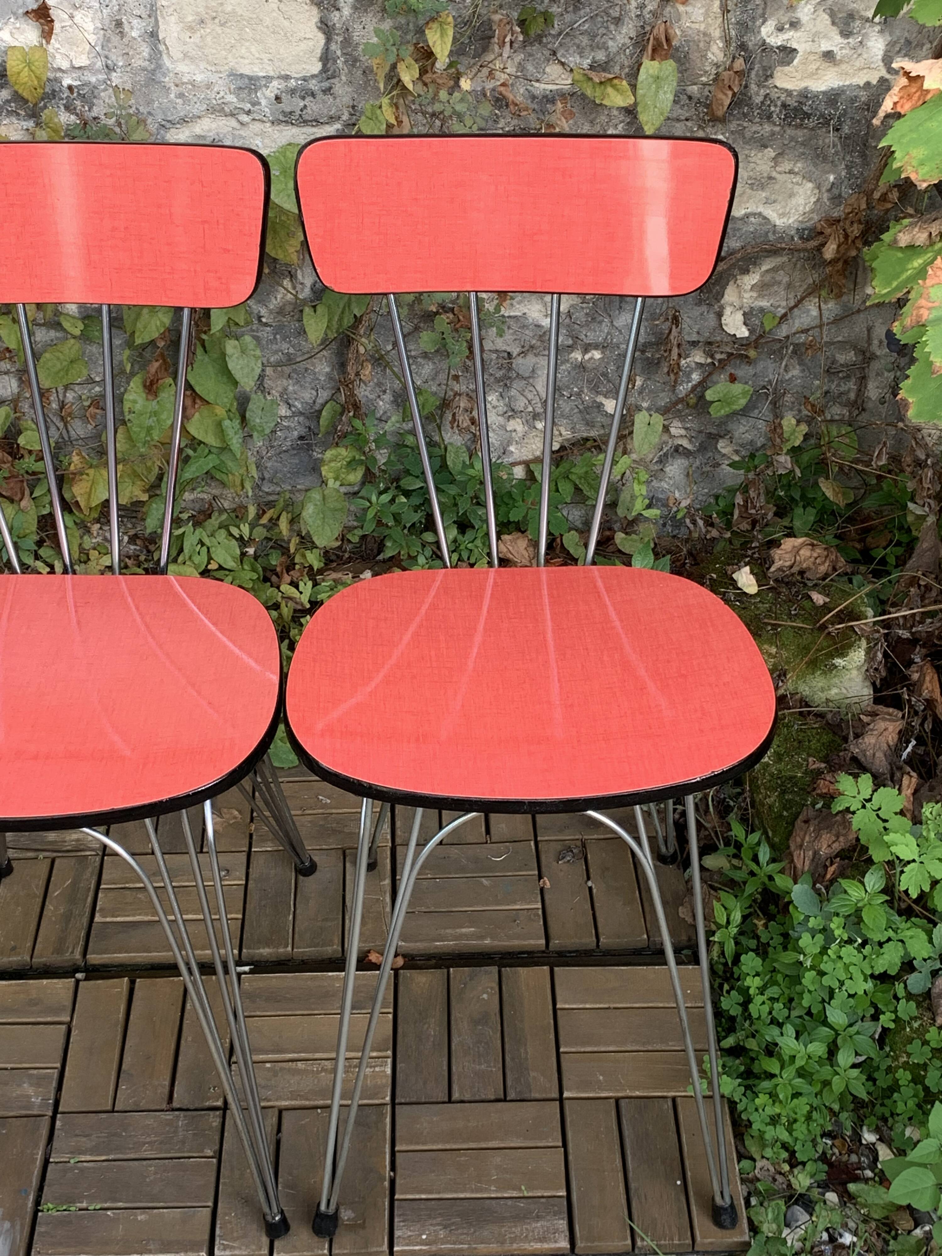 4 red Formica chairs with Eiffel legs, 1950s