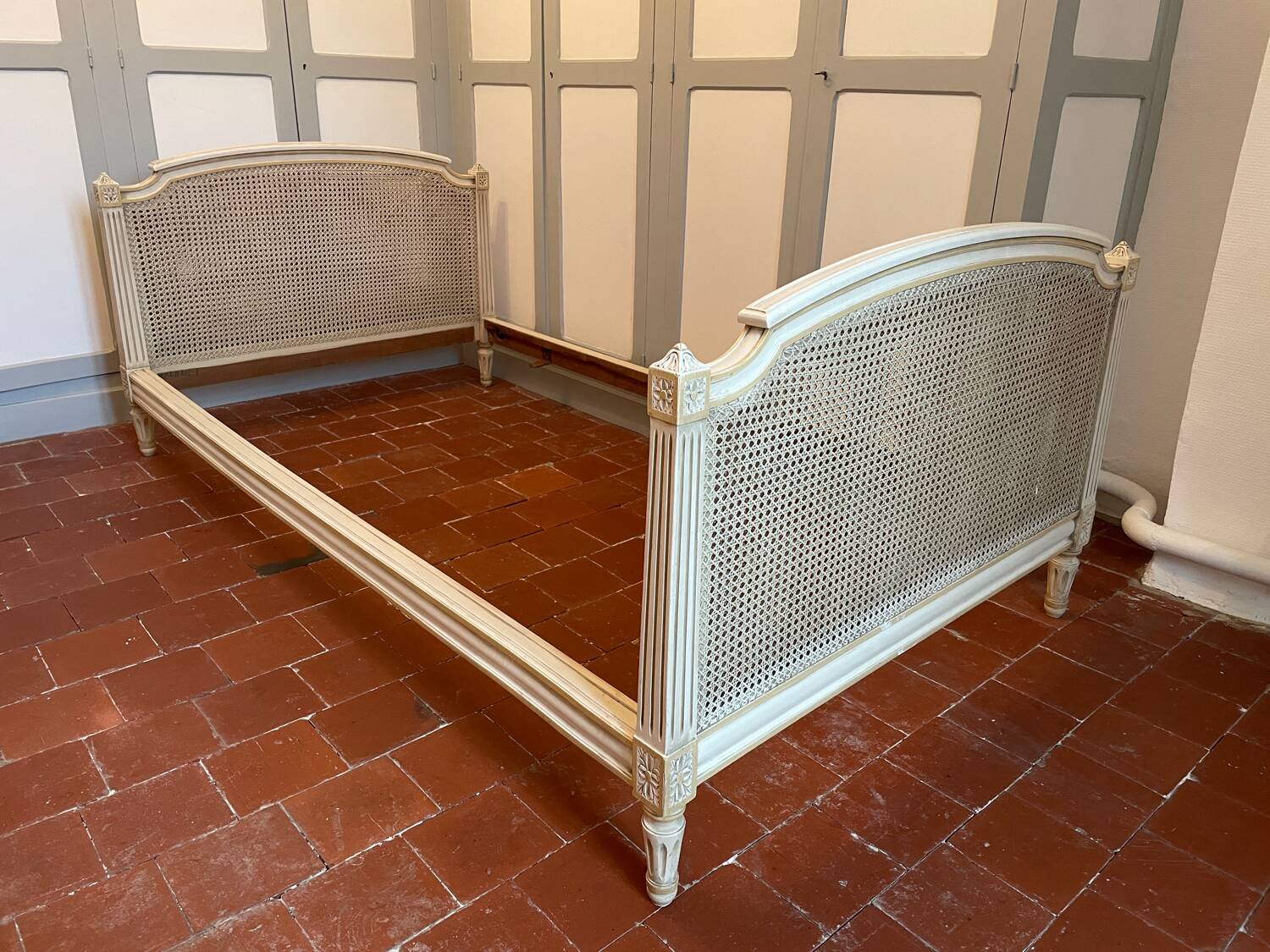 Louis XVI cane and wood bed