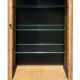 Restored antique oak display cabinet, black background, glass shelves.