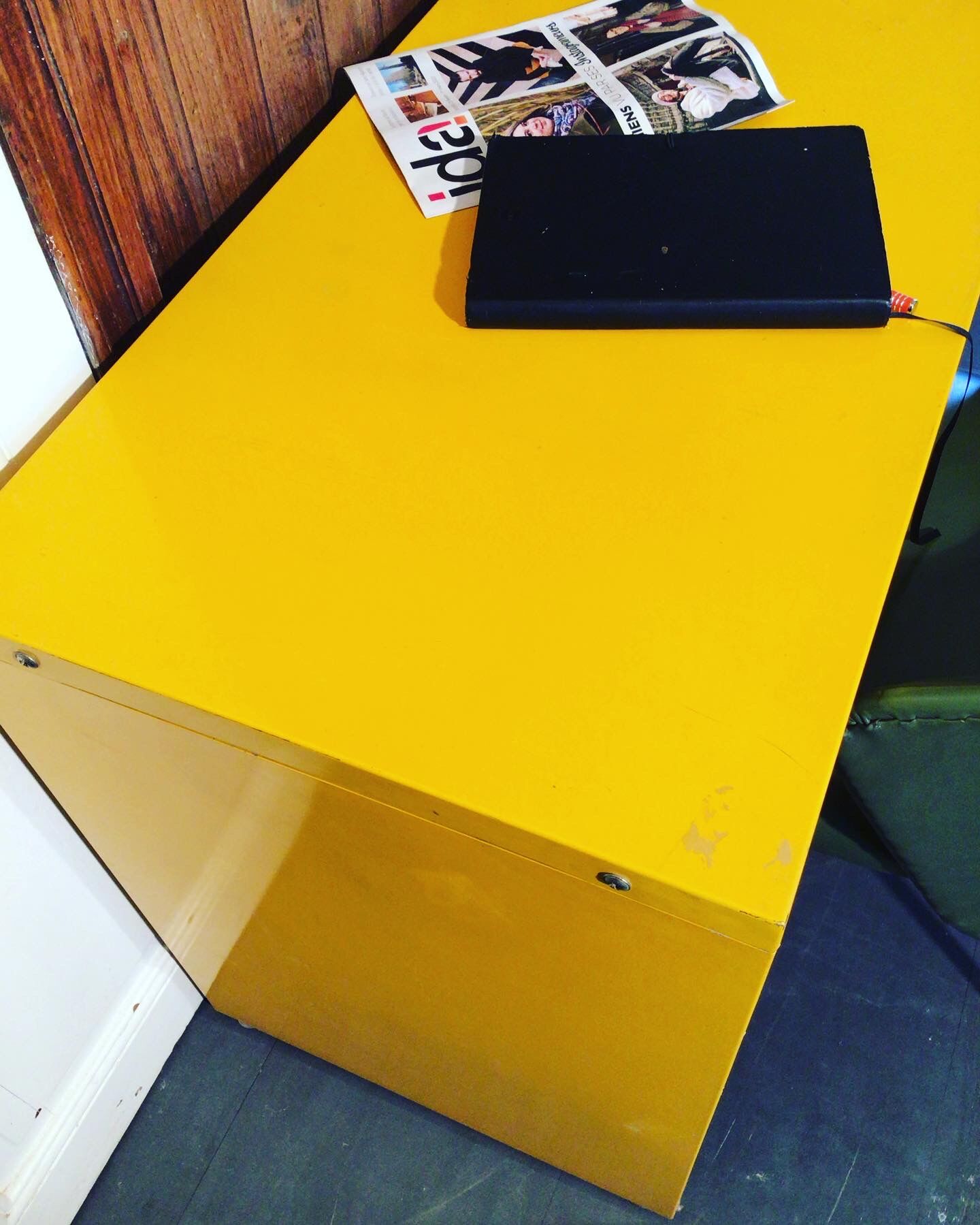 Small yellow metal desk