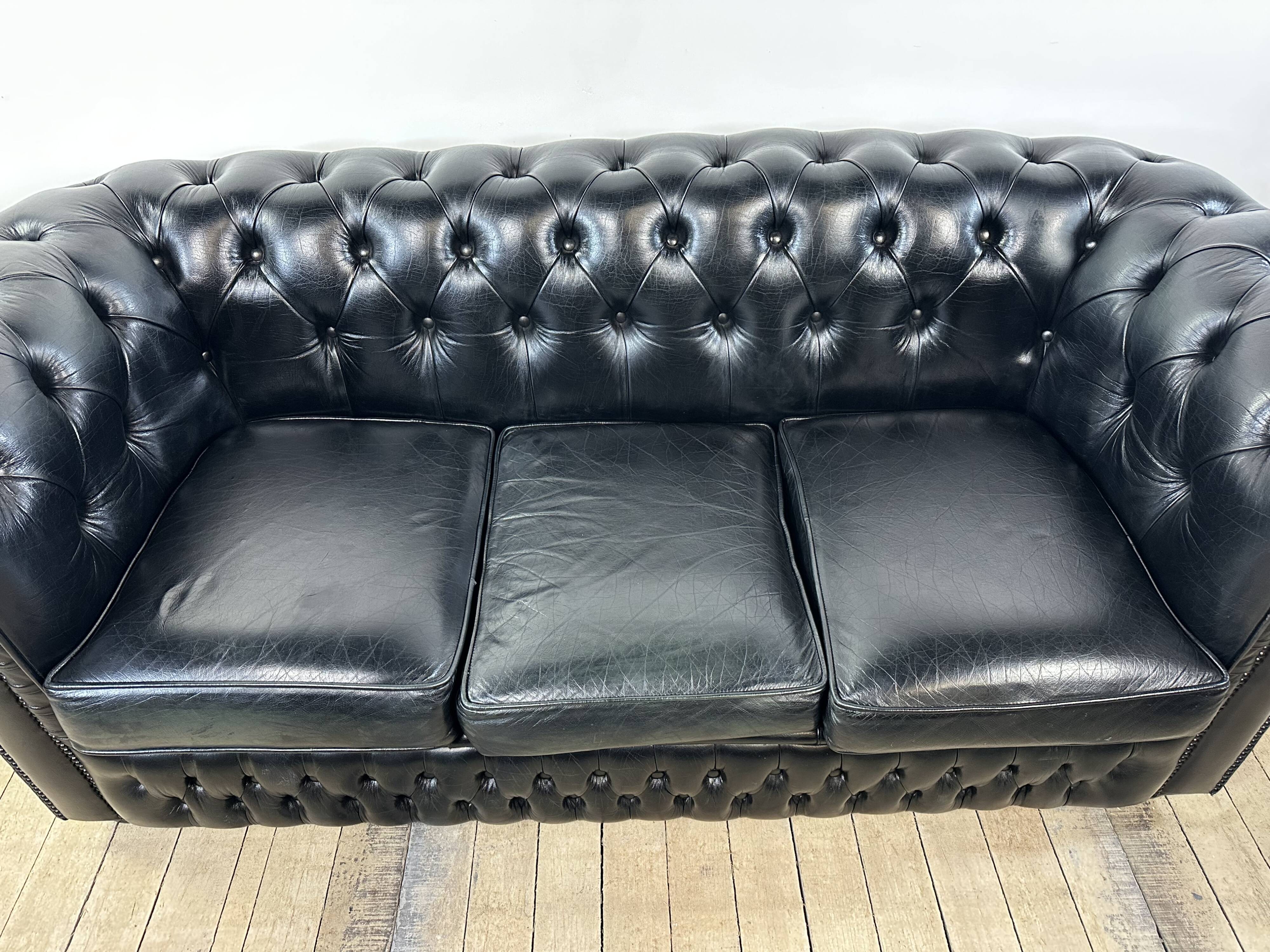 Vintage 1980 black leather Chesterfield sofa