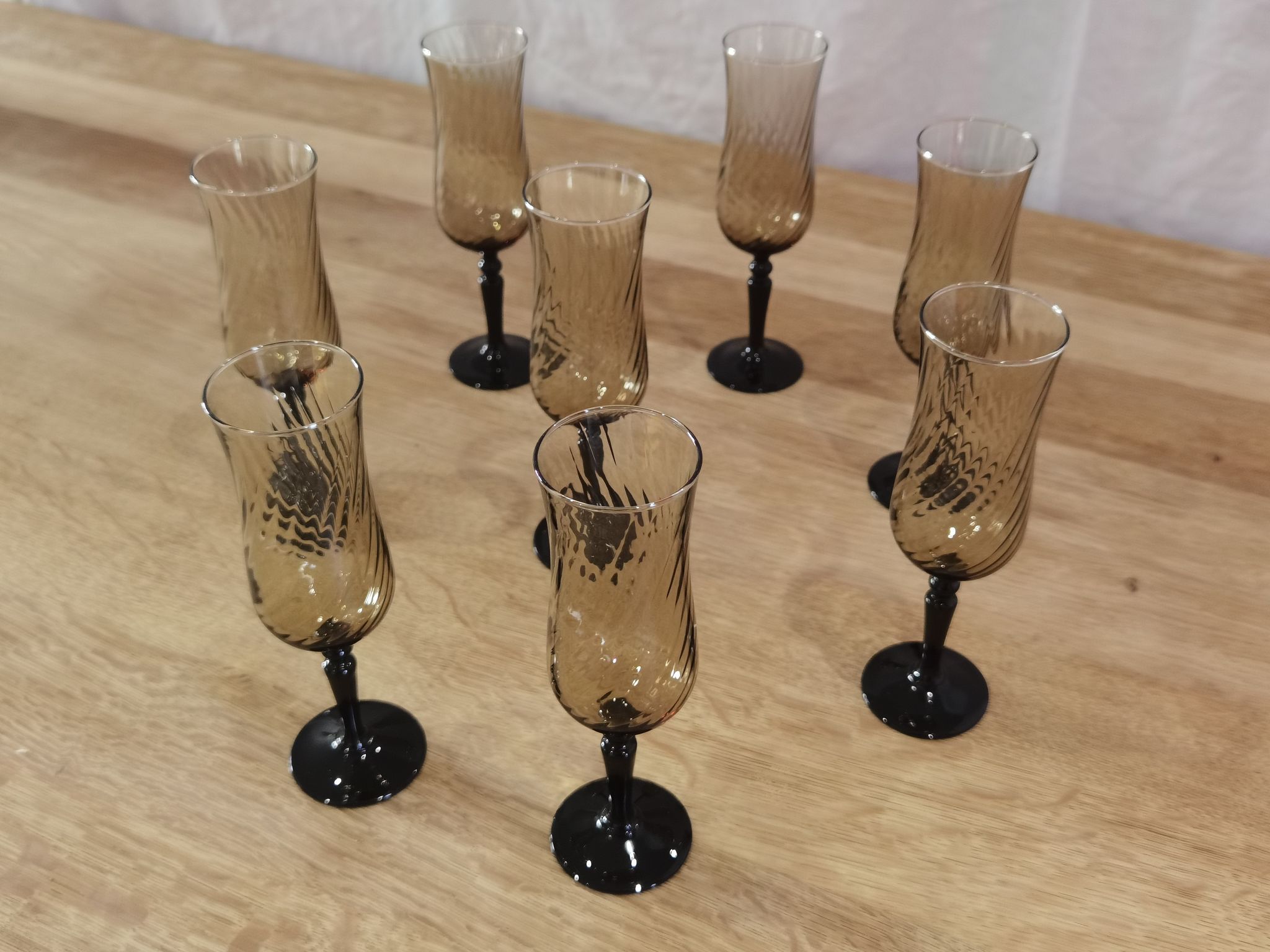 8 vintage smoked champagne flutes with black feet Arcoroc