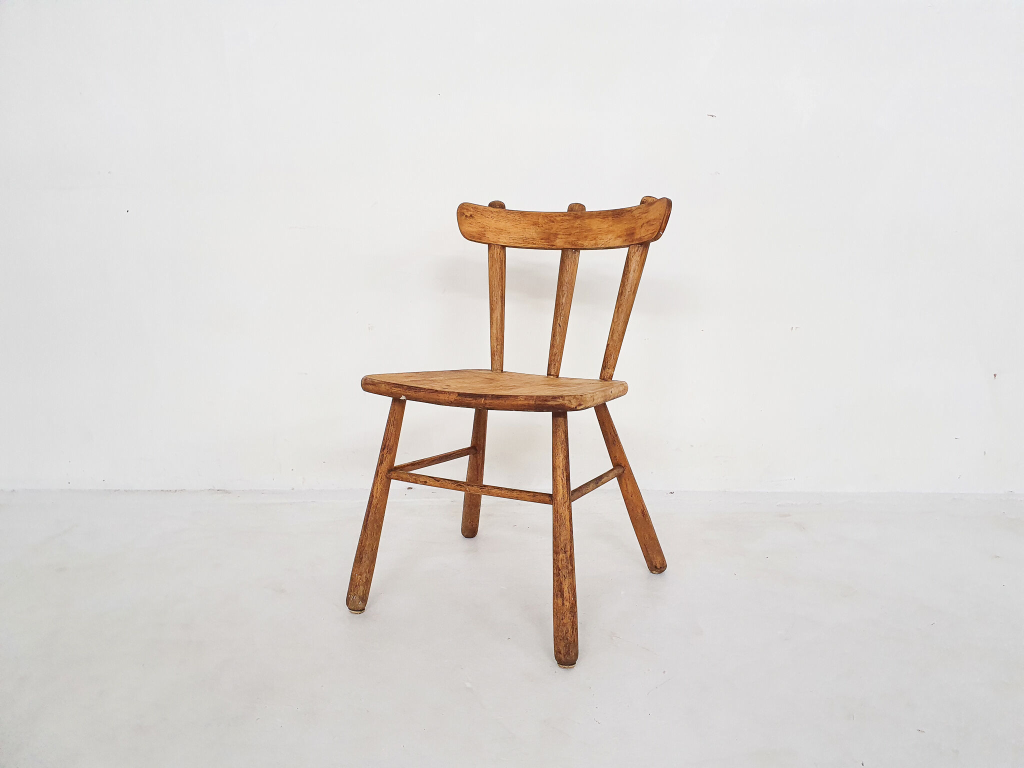 Scandinavian birchwood spindle back chair in the style of Ingvar Hildingson, Sweden 1950's