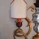 Important Baguès wall light in gilded wrought iron