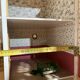 Large wooden dollhouse with miniature furniture