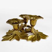 Art Nouveau style three-flower brass candle holder