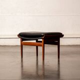 Finished Juhl armchair and its ottoman.